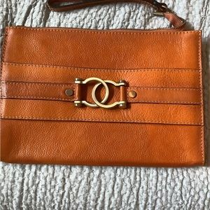 WOMENS USED ONCE LEATHER TABLET/MESSENGER BAG.  MADE IN ITALY